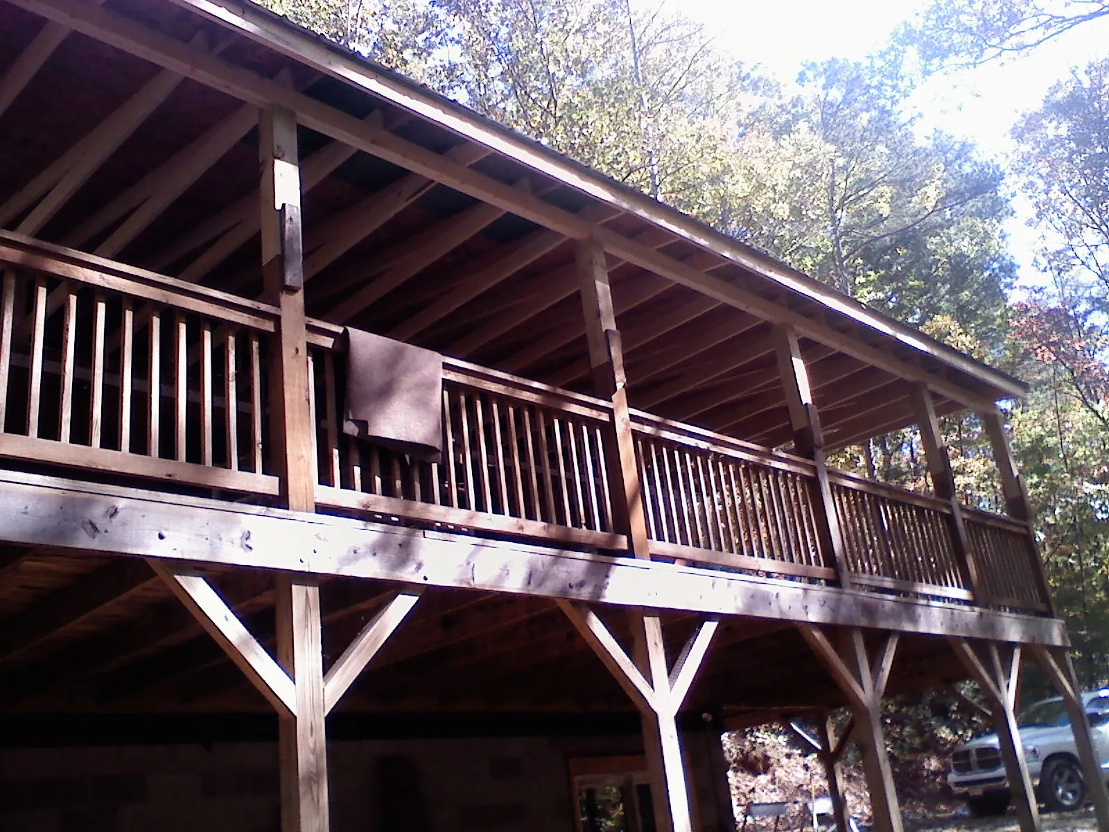 Timber framing under a new elevated porch and deck — Roof Leak Repair in Hornell by Roofing Brothers